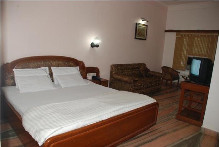 Отель Padma Пури Номер фото